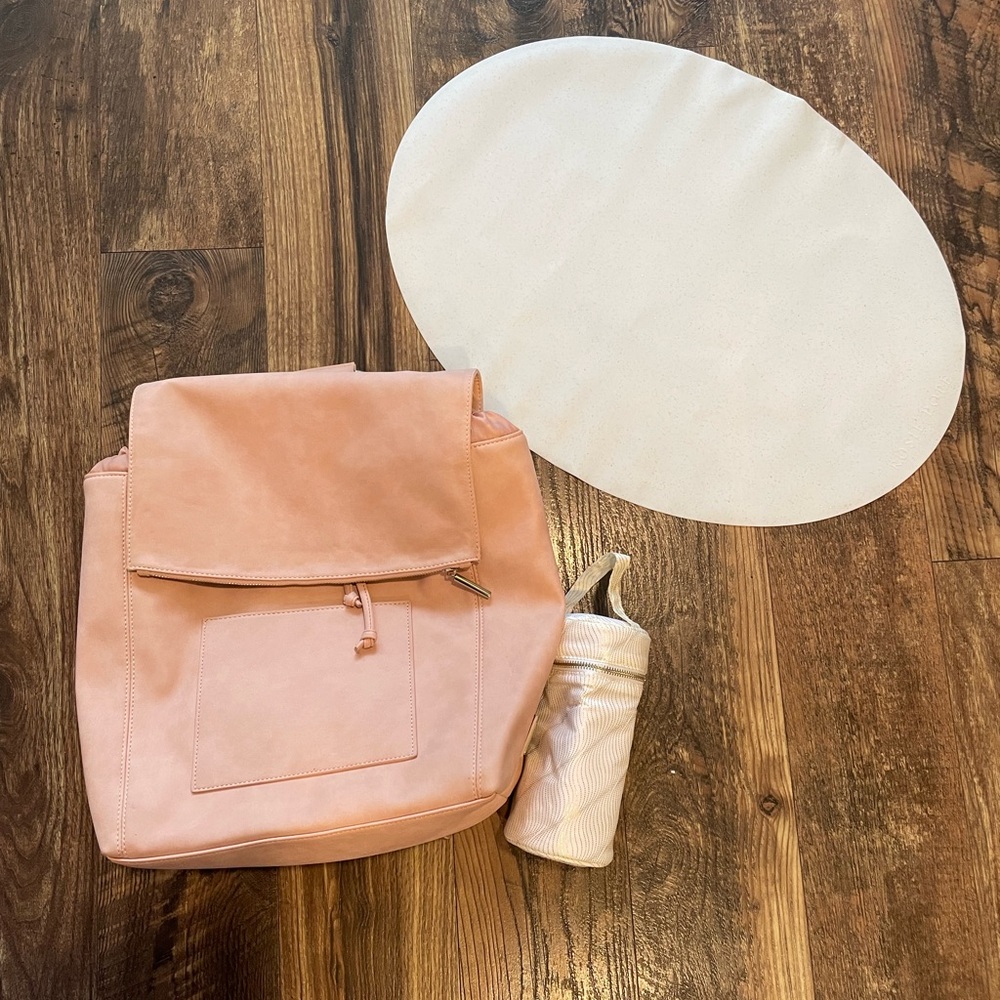 Brand new never used ROSIE POPE BLUSH diaper bag backpack with accessories.
